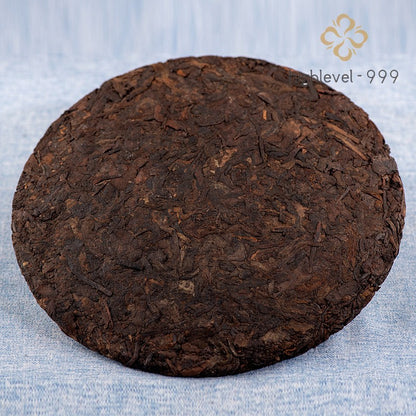 357g Ripe Pu'er Yunnan Menghai Dry Stored Aged Qi Zi Compressed Tea Cake