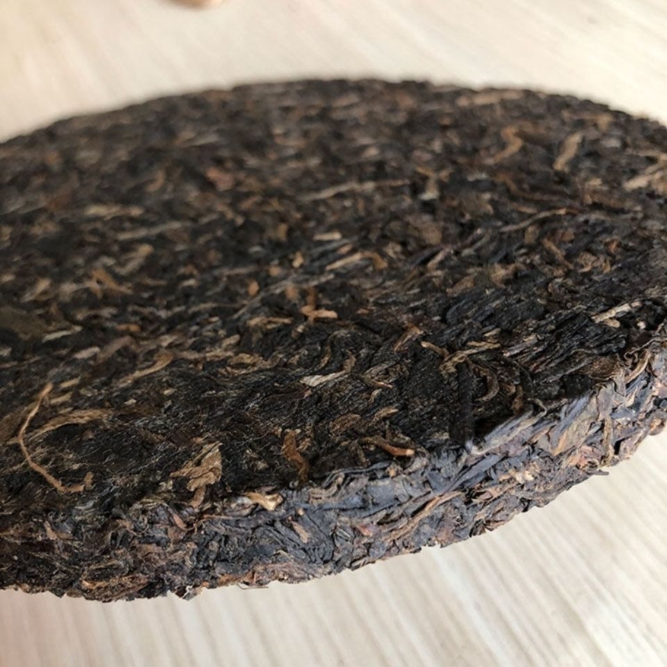 Kunming Tea Factory CNNP 8281 Big Yellow Label Pu'er Iron Cake Tea 2007 380g Raw