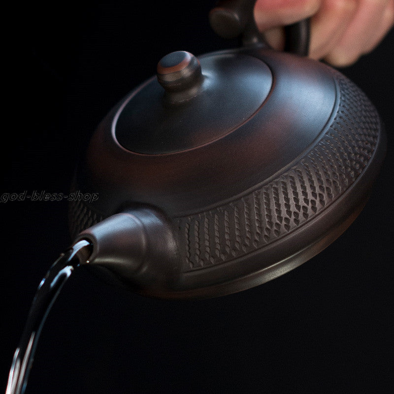 China JianShui Purple Pottery Tea Pot Creative Handmade Pot Xishi Ball Infuser