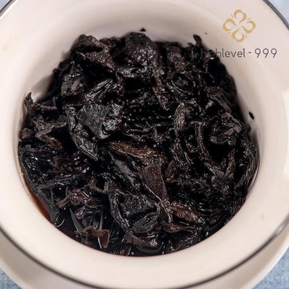 357g Ripe Pu'er Yunnan Menghai Ba Nian Chen Yun Qi Zi Compressed Tea Cake