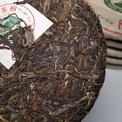 2004 Chun Ming Factory Gold Award Long year Old Tree Yiwu Pu-erh Tea 357g Raw