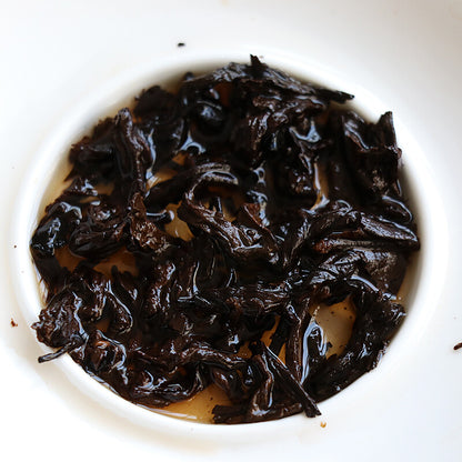 Li Ming 7590 Octagonal Pavilion Yunnan Aged Pu-erh Tea Cake 2010 357g Ripe Puer