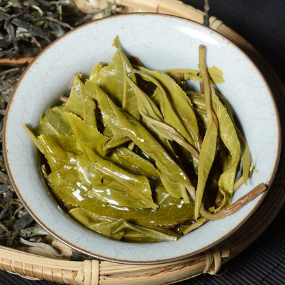 New tea Yunnan Puerh tea raw tea loose tea Mingqian first spring tea 100g