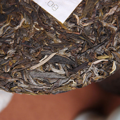 Chinese Haiwan"Lao Tong Zhi" FOR WORLD Menghai Pu erh RAW Tea Cake,er unCooked