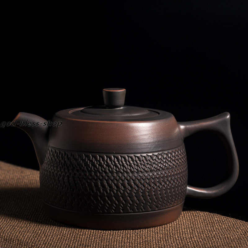 China JianShui Purple Pottery Tea Pot Creative Handmade Pot Xishi Ball Infuser