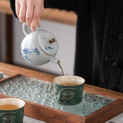 chinese porcelain blue glazed mask tea cup