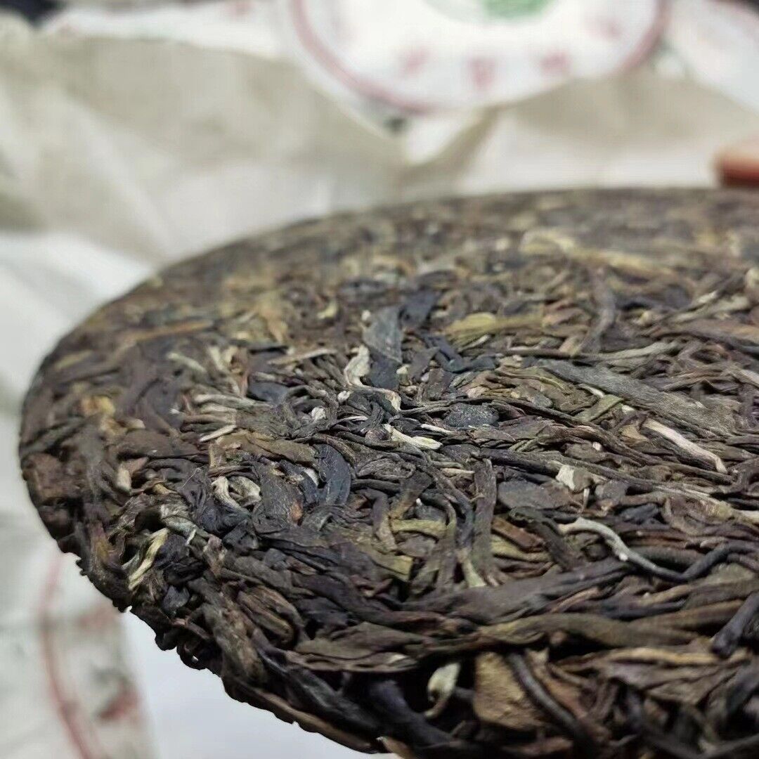 Yunnan Tea Seven Seeds Cake Cabbage Ancient Tree Pu'er Tea Raw Tea 357g Cake Tea