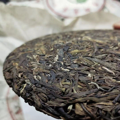 Yunnan Tea Seven Seeds Cake Cabbage Ancient Tree Pu'er Tea Raw Tea 357g Cake Tea