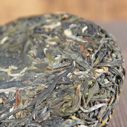 100g Raw Pu-erh Tea Kunlu Mountain Ancient Tree Menghai Mini Compressed Tea Cake