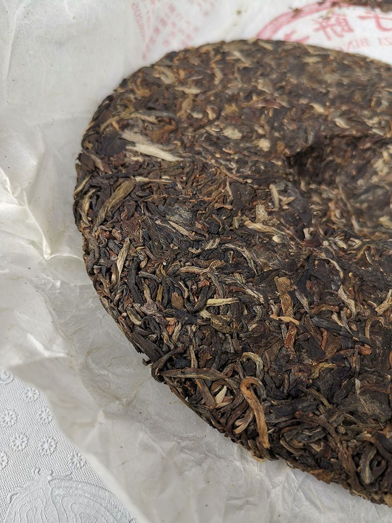 Dawn Light * 2006 KONG QUE ZHI XIANG QI ZI BING CHA Puer Raw Green Cake 357g