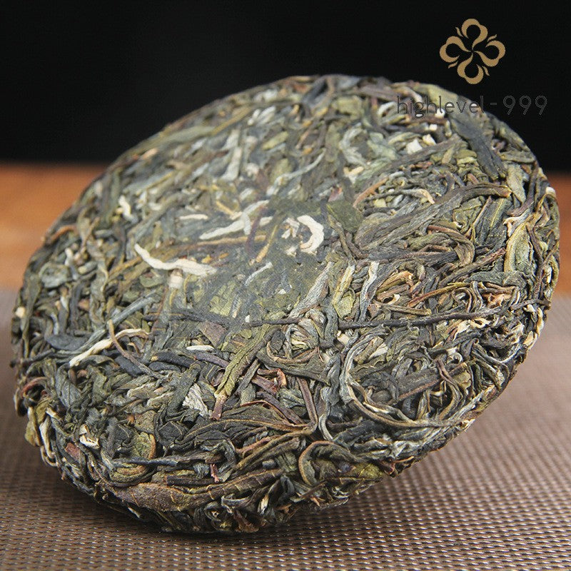 100G raw Pu'er Yunnan Yiwu ancient tree sun-dried compressed Qizi tea cake -