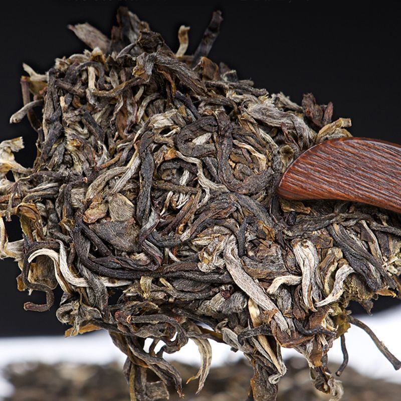 Ancient Tree Spring Tea Brown Mountain Peacock Cake Yunnan Puerh Tea 100g