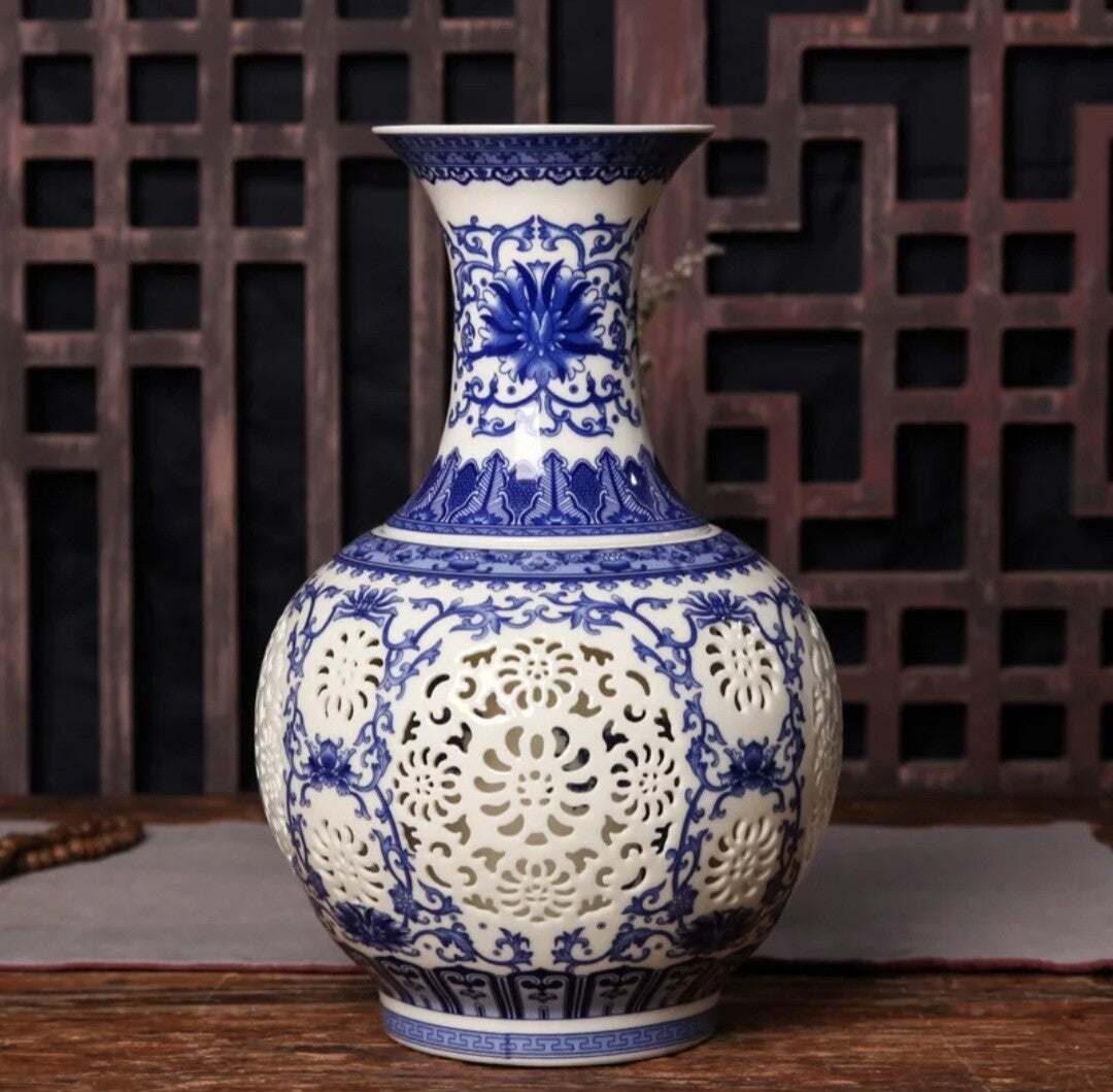 11" China Blue-and-white Porcelain Hollow Ceramics Twisted Branches Lotus Vase