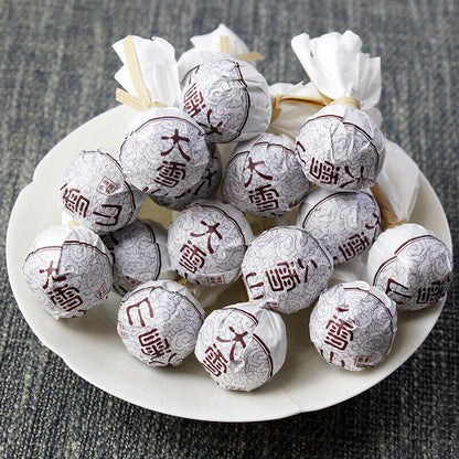 500g Yunnan Lincang Daxueshan Pu'er tea ripe tea ancient dragon pearl tea ripe