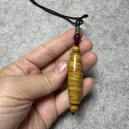 Golden Nanmu Ebony Pendant 1.89*0.47in Wave Grain Dzi Bead Shape Unisex Handmade