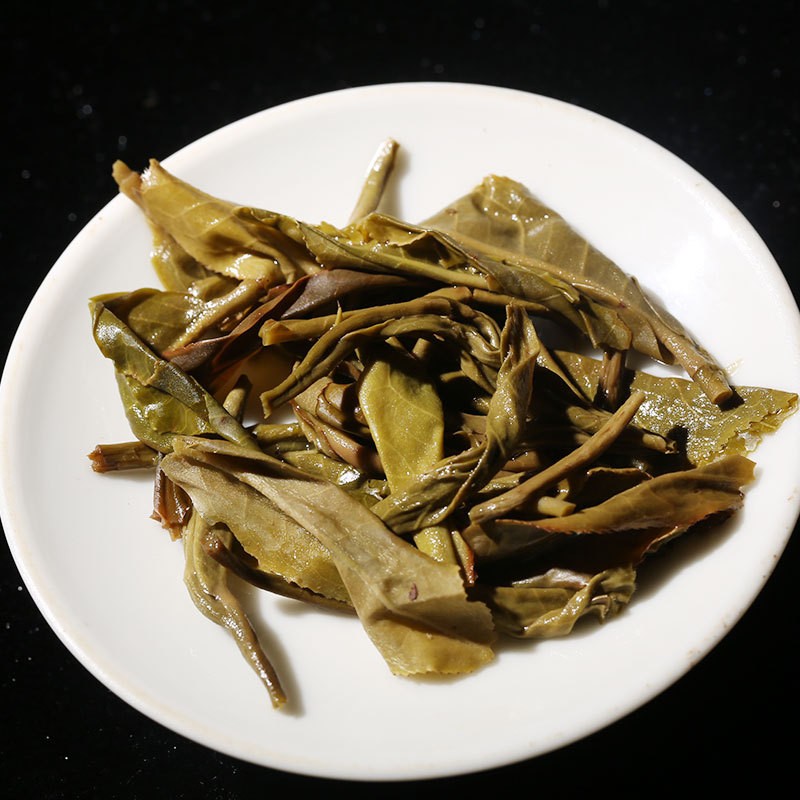 100g Raw Pu'er Mini Tea Cake Yunnan Mengku Bingdao Rich Floral Aroma