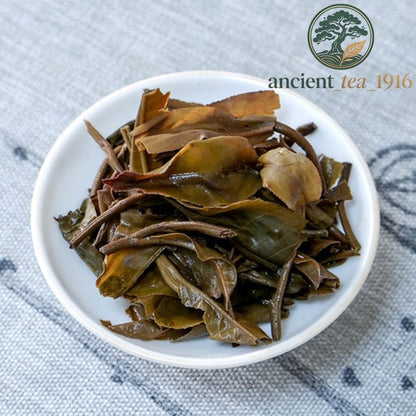 357g Pu'er Raw Tea Yi Wu Yunnan Aged Tea Cake