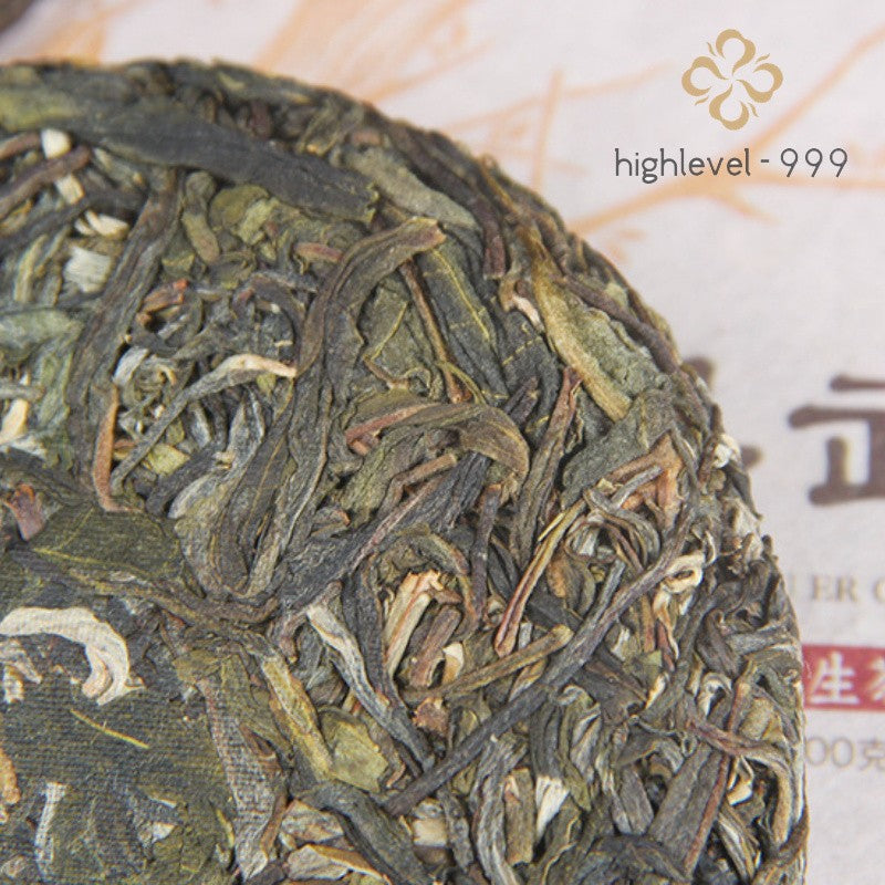 100G raw Pu'er Yunnan Yiwu ancient tree sun-dried compressed Qizi tea cake -