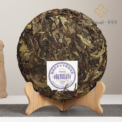 357g Raw Pu'er Yunnan Nannuoshan Big Old Tree Qi Zi Compressed Tea Cake