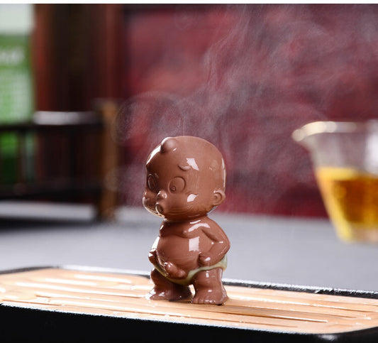 funny pee doll porcelain purple clay tea pet water spray lovely boy statue small