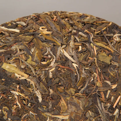 Nannuo Mountain Qizi Tea Cake Classical Early Spring Cha Puerh 357g Puerh Tea