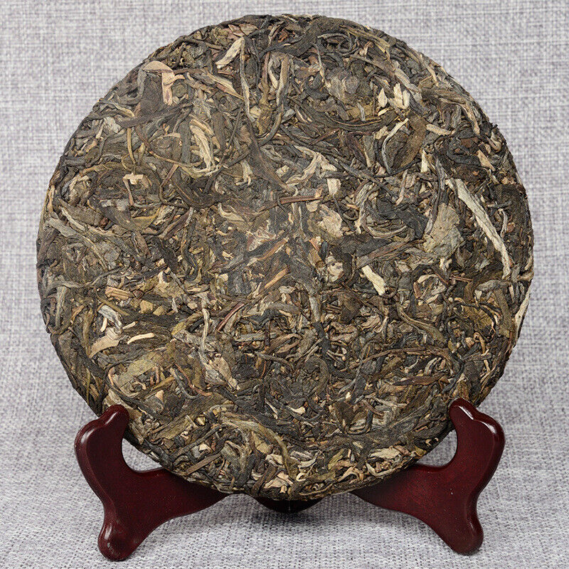 Pu'er Tea 2014 Spring Tea Ancient Tree Tea Yunnan Seven Seed Cake Tea 357g