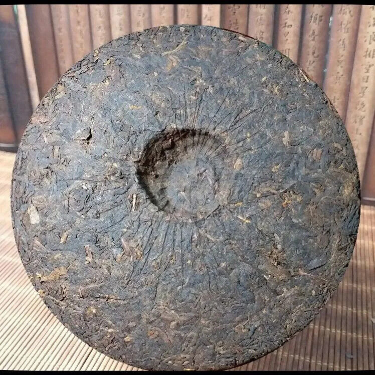 Yunnan Aromatisierter Pu'er Kuchentee Qizi Kuchentee Menghai Reifer Tee 357g