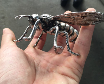Hand sculpture of the Miao silver statue, realistic dragonfly
