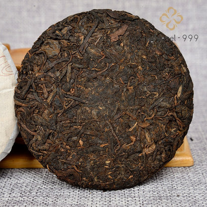 100G Ripe Pu'er tea cake Yunnan native golden bud fermented Pu'er -