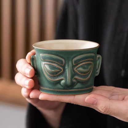 chinese porcelain blue glazed mask tea cup