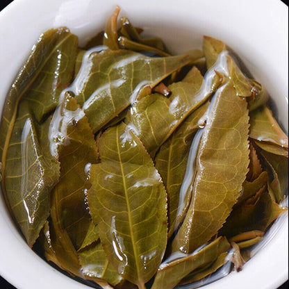 Yunnan Old Ancient Tree Tea Leaves Icelandic Pu'er Tea Raw Tea Cake 357g