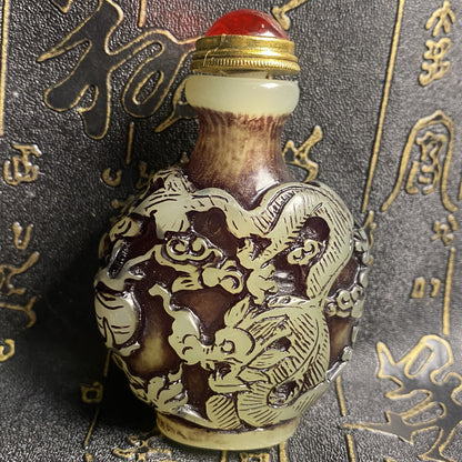 Ancient Chinese beautifully carved dragon and phoenix luminous snuff bottle
