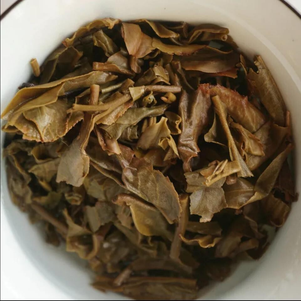 2015 CHINA Menghai qizi puer tee,Golden Peacock Arbor,Raw Pu-erh Tea Cake, 357g