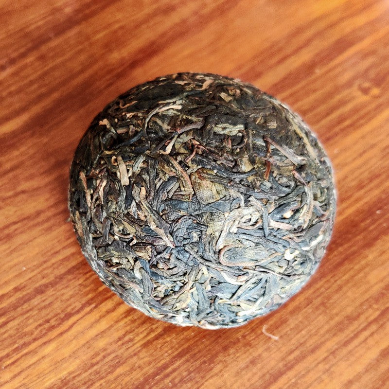 100G genuine Yunnan ancient tree Chen Ning Yi Wu raw tea Pu'er tea Xiaotuo tea -