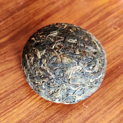100G genuine Yunnan ancient tree Chen Ning Yi Wu raw tea Pu'er tea Xiaotuo tea -