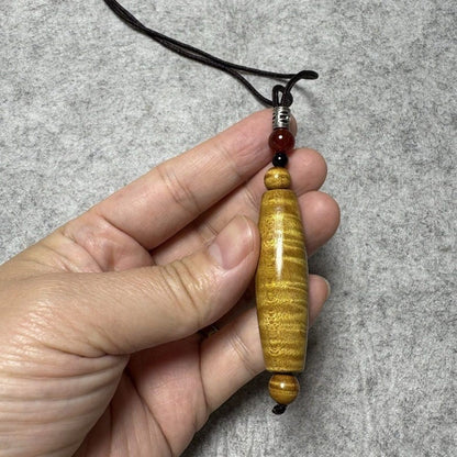 Golden Nanmu Ebony Pendant 1.89*0.47in Wave Grain Dzi Bead Shape Unisex Handmade