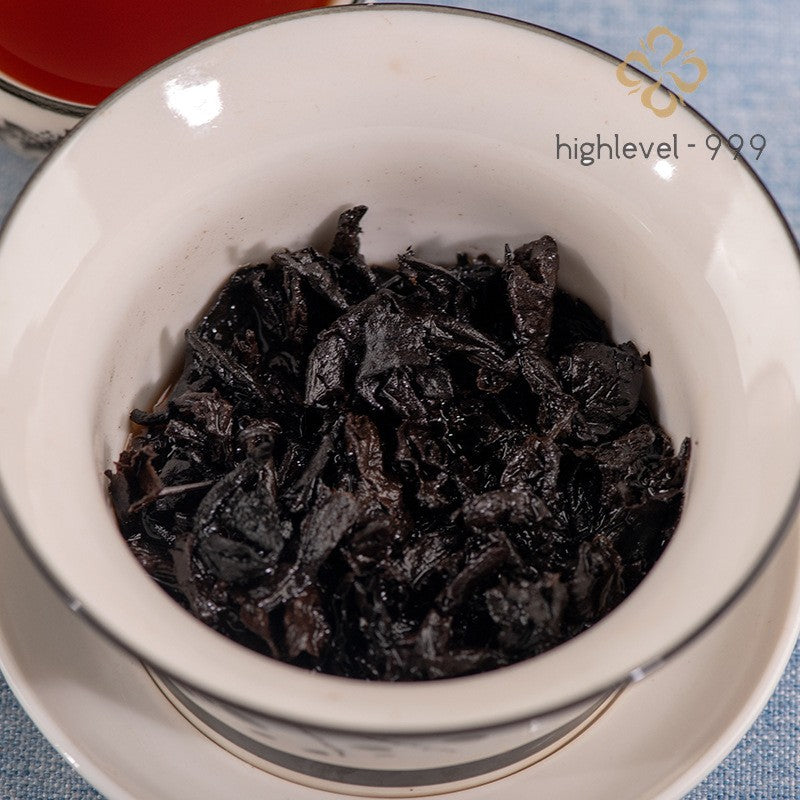 357g Ripe Pu'er Yunnan Menghai Dry Stored Aged Qi Zi Compressed Tea Cake