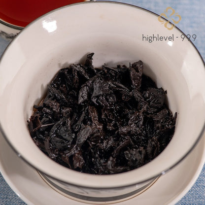 357g Ripe Pu'er Yunnan Menghai Dry Stored Aged Qi Zi Compressed Tea Cake