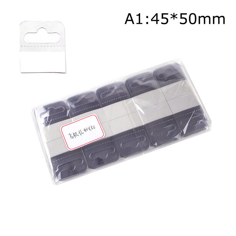 100pcs PVC Slot Hole Adhesive Hang Tags Hook Merchandise Box Bag Hangers Displa'
