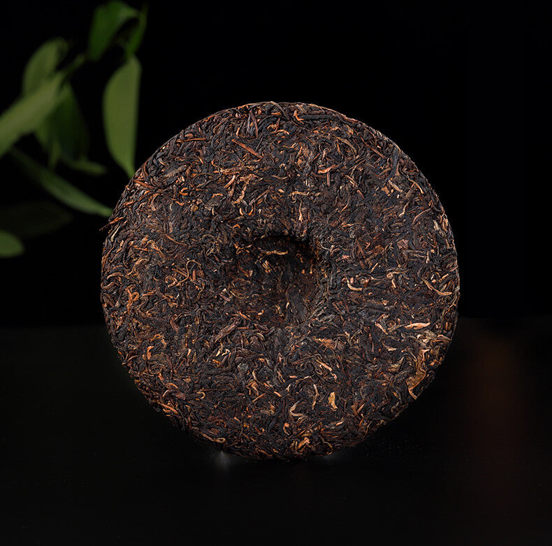 2006 Bajiaoting Valley Flower Tea Raw Pu'er KONG QUE ZHI XIANG QI ZI BING 357g