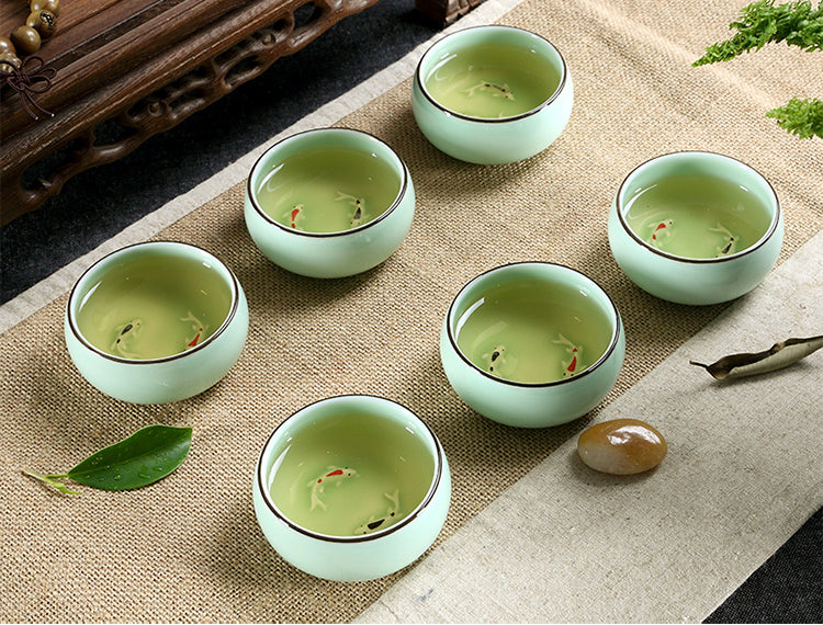 1pc Chinese celadon tea cup fish carved porcelain couple lover cup of tea
