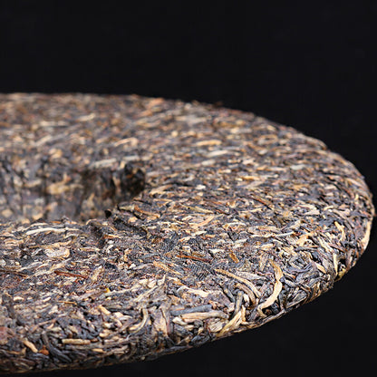 Yin Zhengong Bing 2007 Nanqiao Menghai Qiao Mu Sheng Tai Cha Puer Raw Tea 250g -