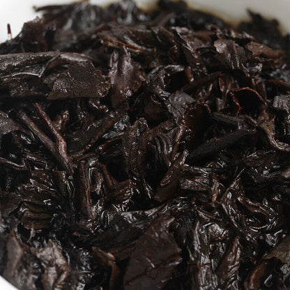 Menghai Pu'er ripe tea small square brick tea leaves sinensis word Pu'er tuocha