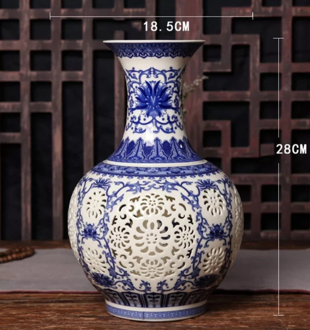 11" China Blue-and-white Porcelain Hollow Ceramics Twisted Branches Lotus Vase