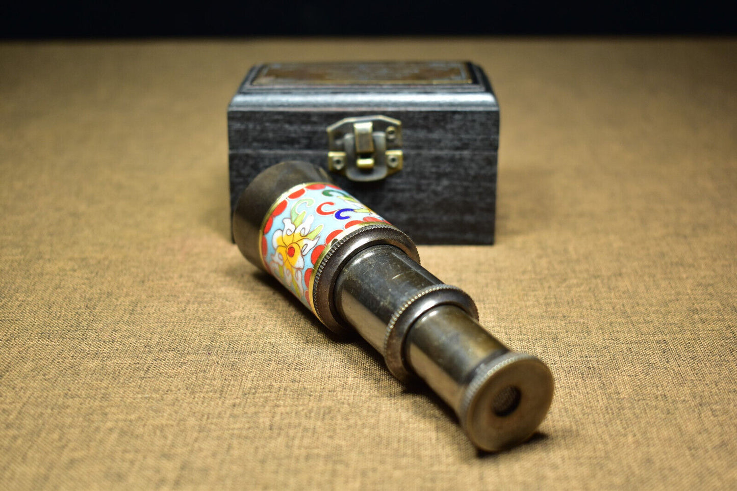 An ancient brass based cloisonne telescope
