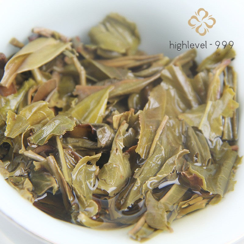 100G raw Pu'er Yunnan Yiwu ancient tree sun-dried compressed Qizi tea cake -