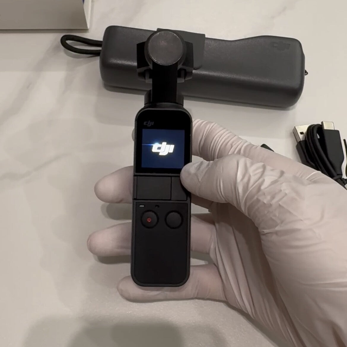 DJI Osmo Pocket-Handheld 3-Axis Gimbal Stabilizer with integrated Camera