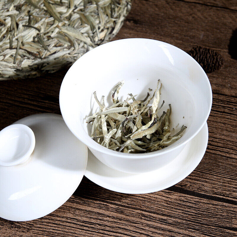 Jinggu Da Baiyao Silver Bud Tribute Cake 357g Yunnan Pu'er Tea White Tea