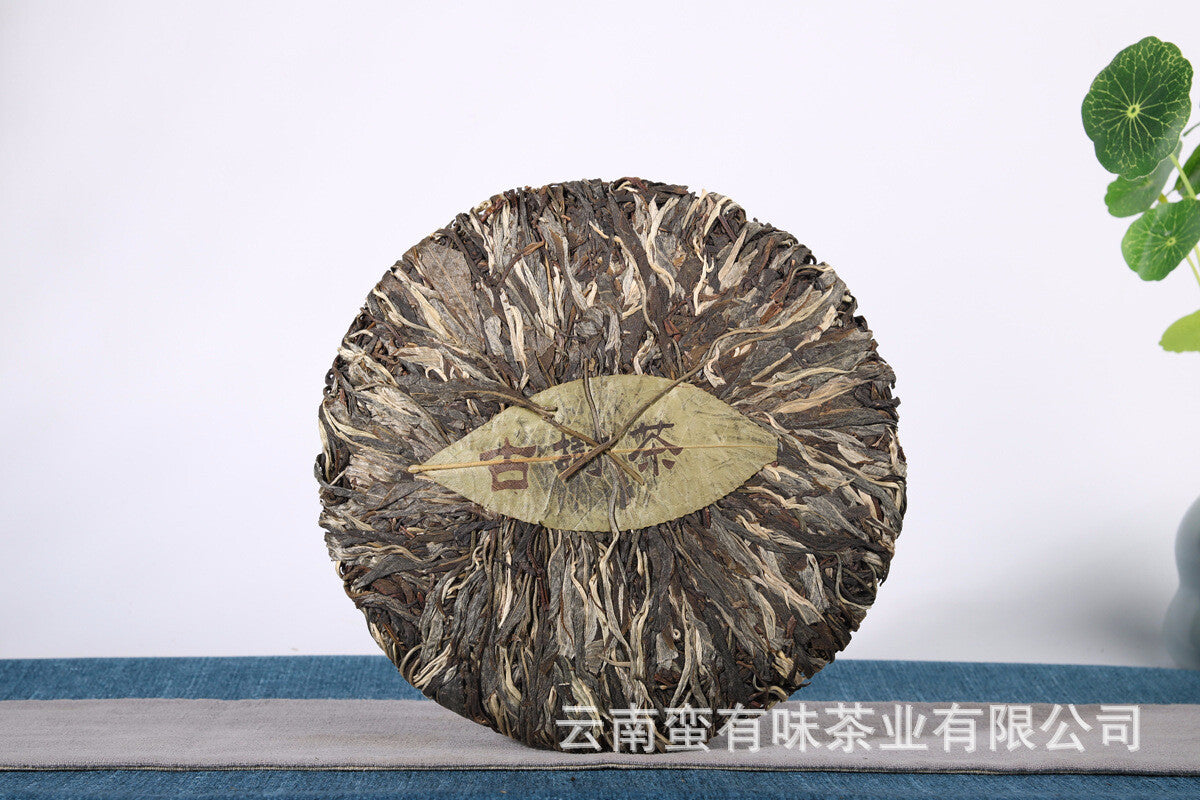 357g Yunnan Pu'er tea leaves Menghai Da Shu tea Putzi tea cake Pu'er raw tea