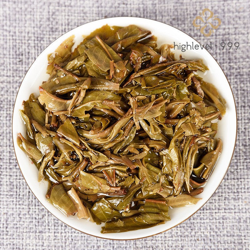 100G raw Pu'er tea cake Yunnan Xiniu Tanggu tree early spring leaf tea -